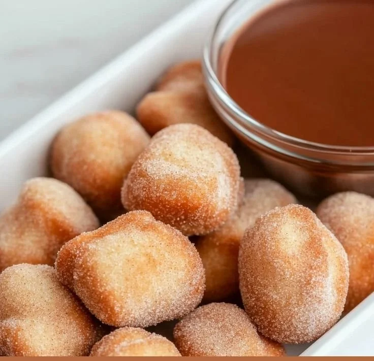 Delicious crispy air fryer churro bites coated with cinnamon sugar