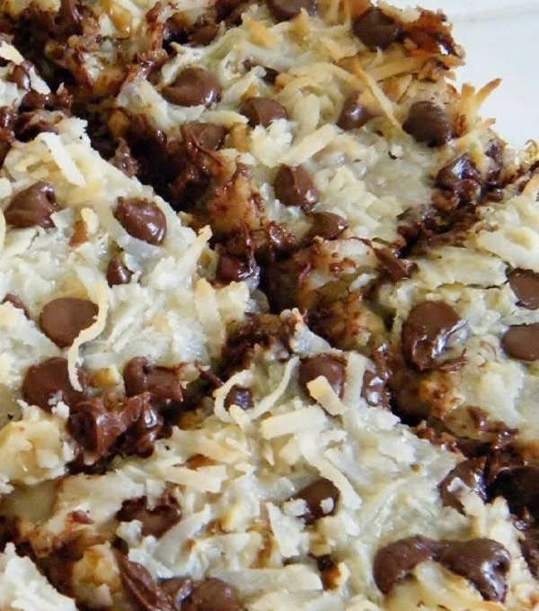 Deliciously layered Magic Cookie Bars with chocolate and coconut toppings
