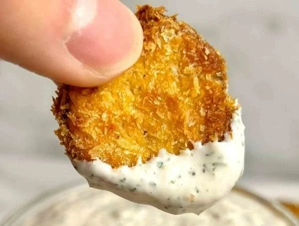 Crispy air fryer fried pickles served with dipping sauce