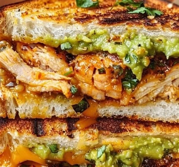 Chicken Avocado Melt Sandwich with grilled chicken and avocado on toasted bread