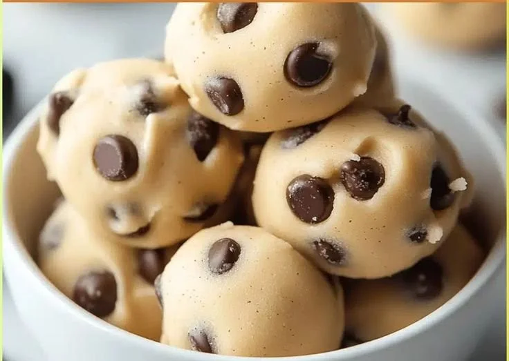 Delicious no-bake cookie dough bites made with chocolate chips and oats.