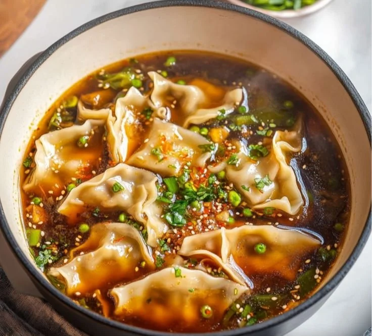 Delicious bowl of homemade Potsticker Soup with dumplings and vegetables