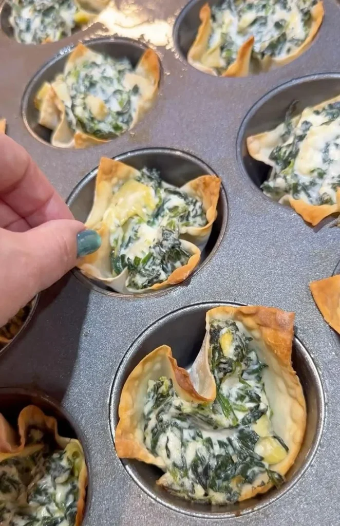 Spinach and artichoke wonton cups served in a crispy shell