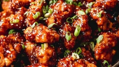 Plate of General Tso's Chicken with broccoli and rice