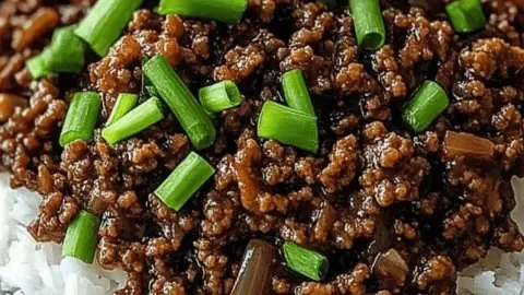 Savory Mongolian Ground Beef dish served with rice and vegetables
