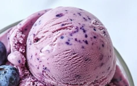 Variety of easy frozen Greek yogurt recipes in bowls with fresh fruits