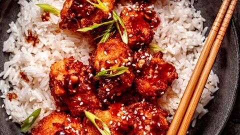 Air-Fried Korean Chili Cauliflower with Gochujang sauce served in a bowl