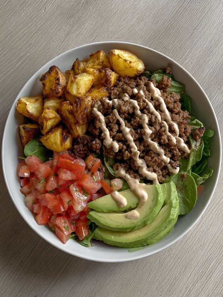 Healthy high-protein burger with fresh ingredients on a plate