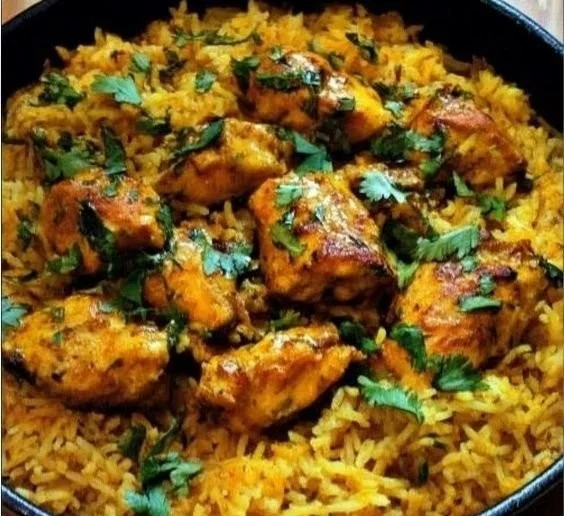 Delicious Moroccan Chicken and Rice served with aromatic spices