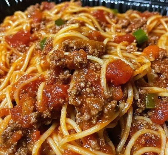 Delicious spaghetti with rich meat sauce in a bowl