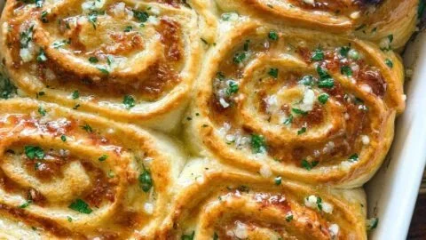 Cheesy garlic rolls baked to golden perfection with melted cheese and garlic butter.