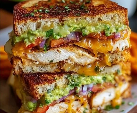 Delicious Chicken Avocado Melt Sandwich with avocado and melted cheese