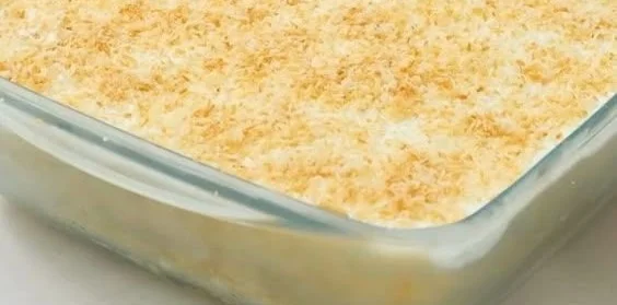 Delicious coconut cream pie with whipped cream and toasted coconut flakes