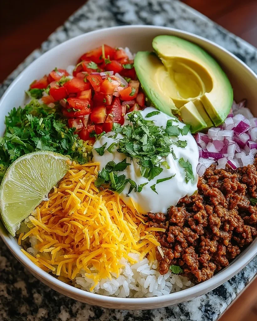 Delicious Taco Rice Bowl with fresh toppings and vibrant ingredients