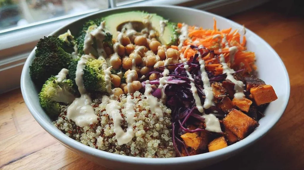 Delicious Vegan Buddha Bowl with colorful fresh vegetables and grains.