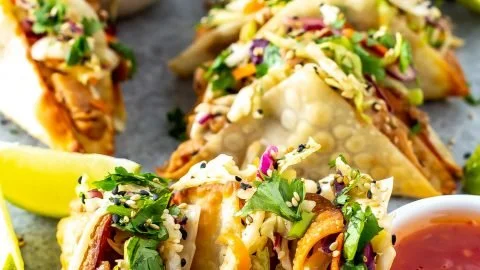 Applebee's Chicken Wonton Tacos served with a zesty dipping sauce