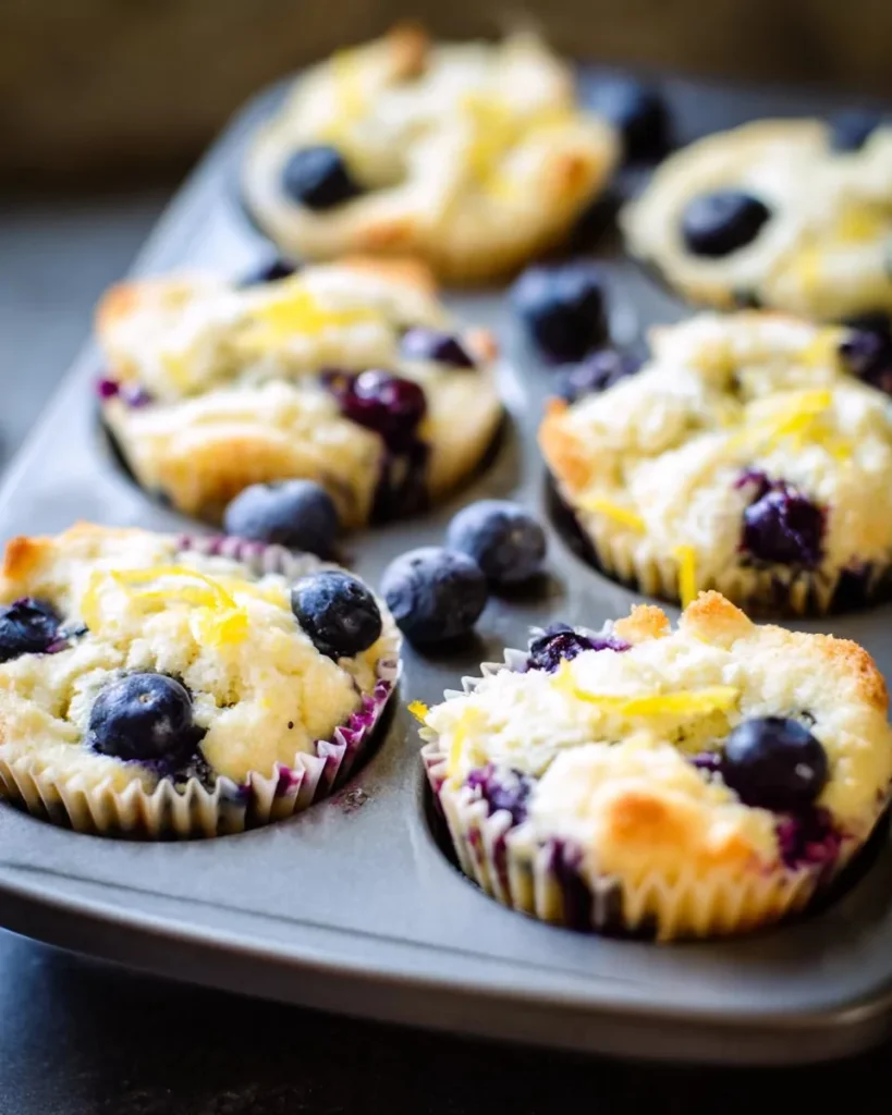 Blueberry and lemon zest cottage cheese bites on a white plate