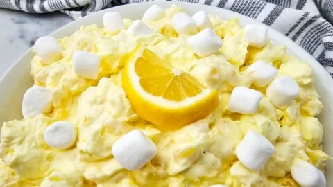 Classic Lemon Fluff Salad with a vibrant lemon texture and fluffy layers