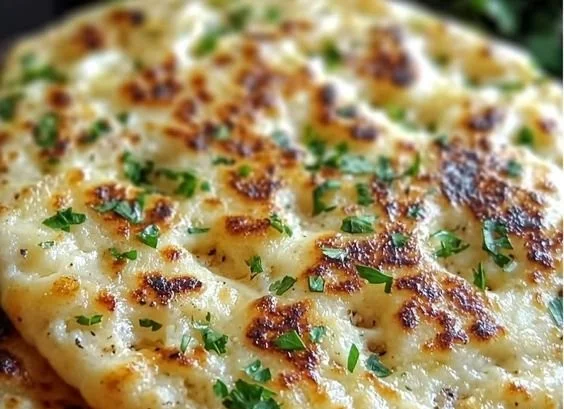 Delicious Cottage Cheese Flatbread topped with fresh herbs and vegetables
