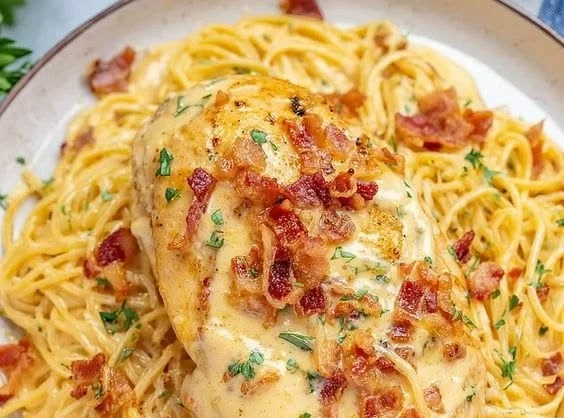 Crock Pot Crack Chicken served in a bowl, garnished with green onions.