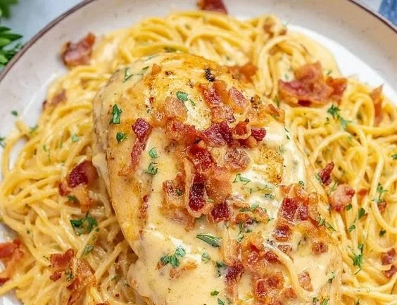 Delicious Crock Pot Crack Chicken served in a bowl with fresh herbs