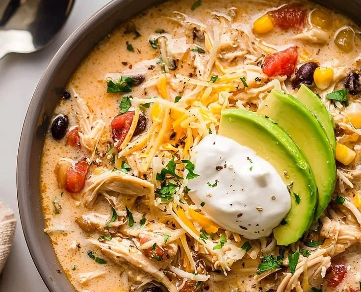 Delicious easy one-pot chili in a bowl topped with fresh herbs
